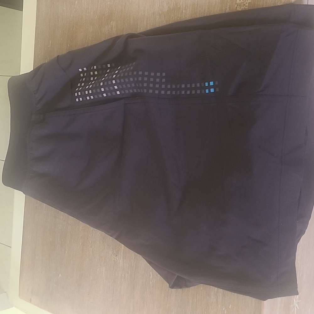 Lululemon Shorts in Size large. Black with squares on each side.